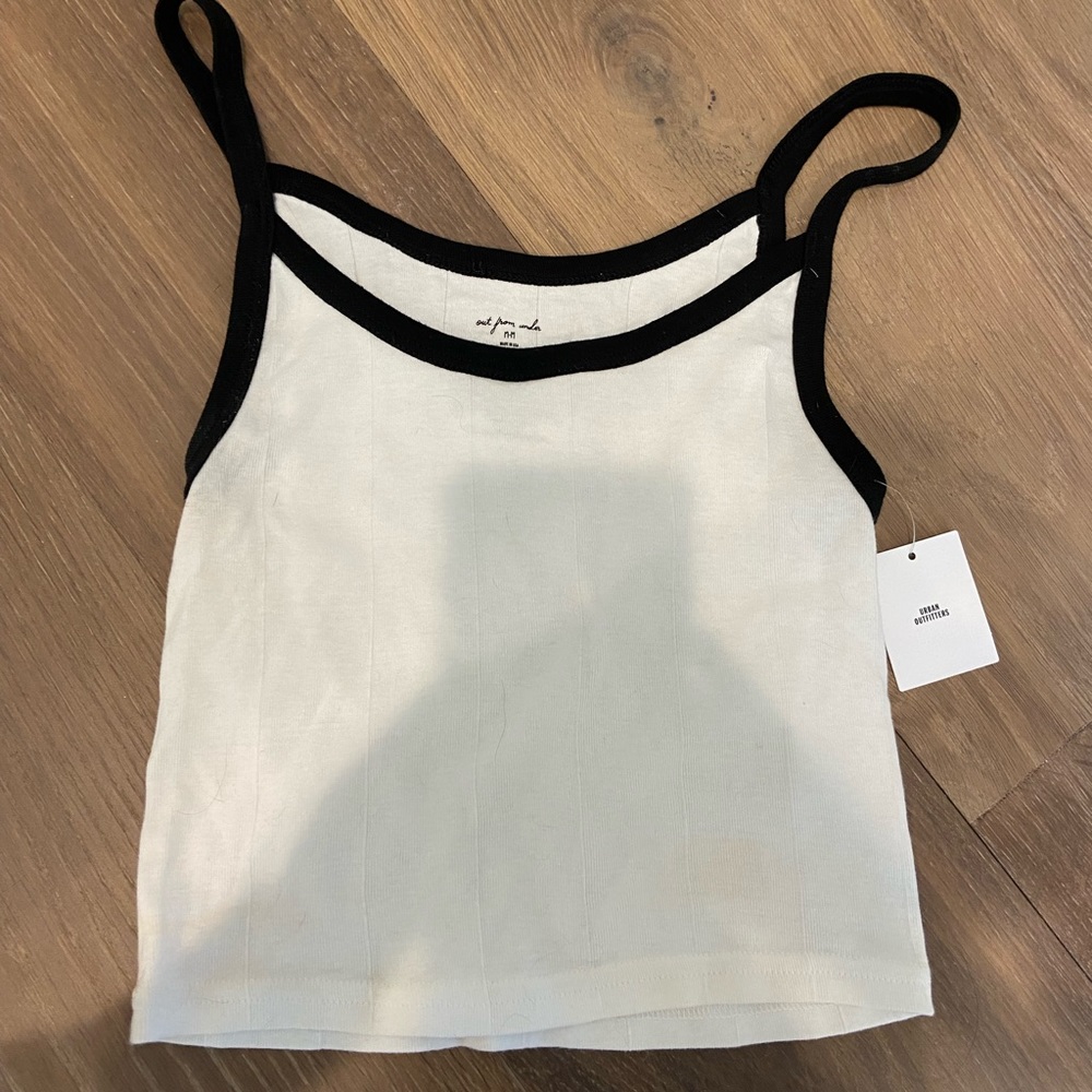 cute white crop top with black straps!